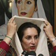 Illustration for article titled Benazir Bhutto Adjusts Scarf In Front Of Own Likeness